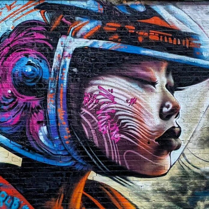 Talented graffiti artist Jim Vision aka Probs has painted a beautiful Asian girl in a space suit in this huge science fiction street art mural