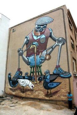 Street artist Pixel Pancho paints a robotic old man happily feeding robot pigeons