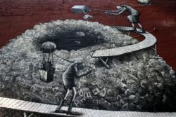 The stories told in street art by Phlegm can often be seen as a comment on modern society and economics