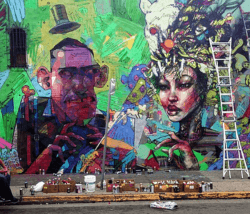 David Choe meets up with graffiti artist Aryz to create this colorful street art mural of a man and a woman