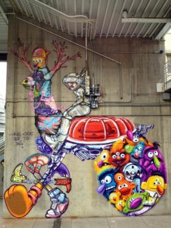 Mutant muppets and a spaceman riding a surreal cartoon animal feature in this awesome and bizarre street art painting by David Choe