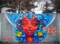 Eve as Medusa is the central figure in this colorful street art painting by Erase