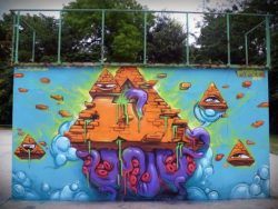 Pyramids and tentacles make up this surreal street art mural in a cartoon style by graffiti artist Erase