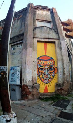 An ugly street in Paraguay gets a face lift with this street art mural by Guache