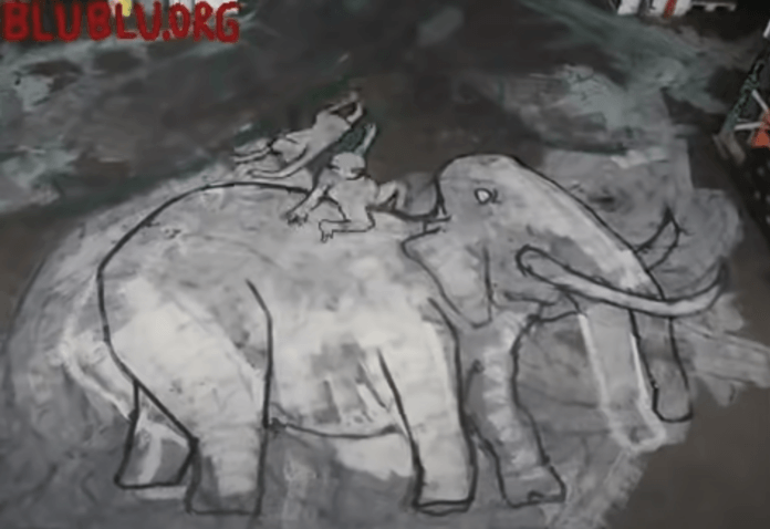 Street artist blu has painted monkeys riding on an elephant in this screenshot of the finished stop frame animation video