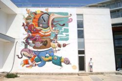 The finished street art mural called Bipolar by pop surrealist street artist Dulk