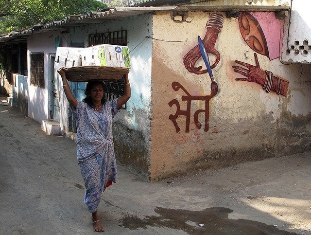 An Indian girl for a wall in India. Seth's street art characters reflect the country that he paints them in.