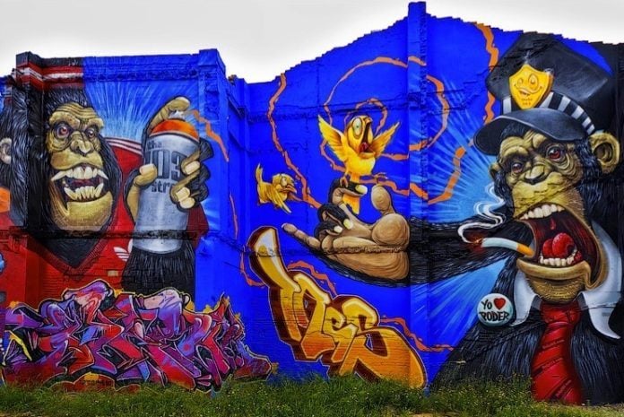 Street artist Duke 103's graffiti characters engage in monkey business