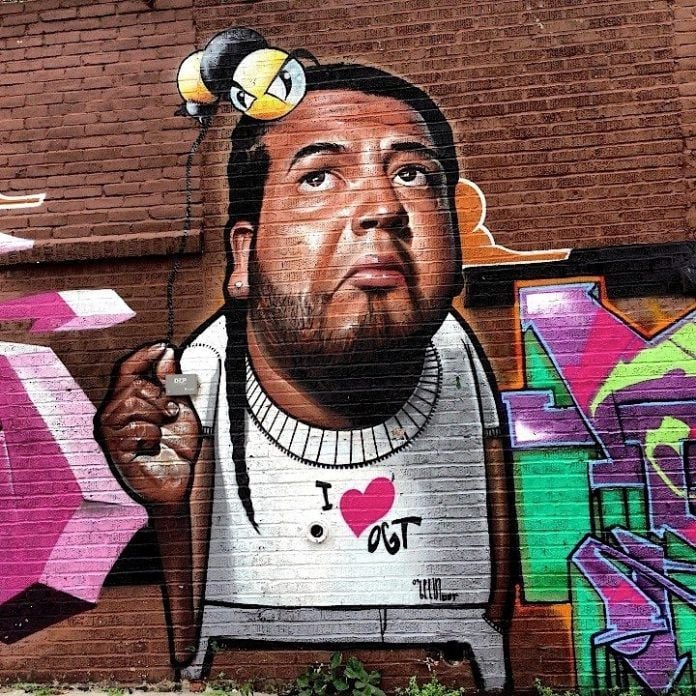 This funny caricature portrait by Belin shows his surreal graffiti character to hold a helium bee on a string