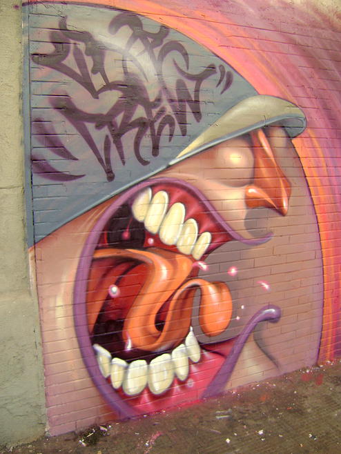 Lelin Alves uses the artistic technique of exaggeration to make this shouting graffiti character appear super angry