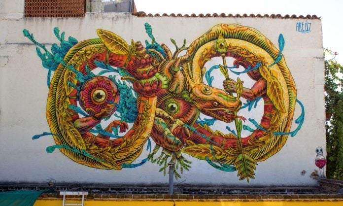 This street art mural by Gonzalo Areúz shows Xiuhcoatl, the fire serpent in Aztec mythology