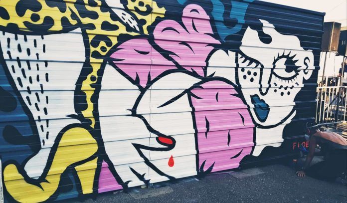 This curvy lady street art mural is by the French graphic designer Floe Mousset