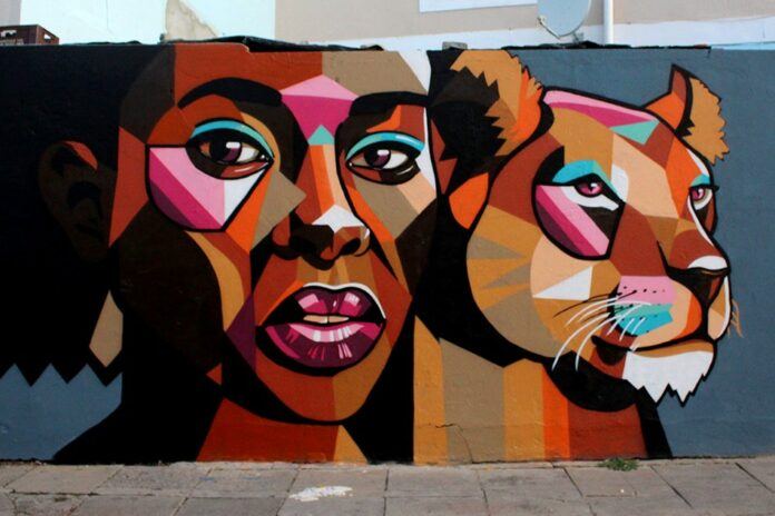 Street artist Nardstar from South Africa depicts an African Lion Queen in this geometric urban art mural